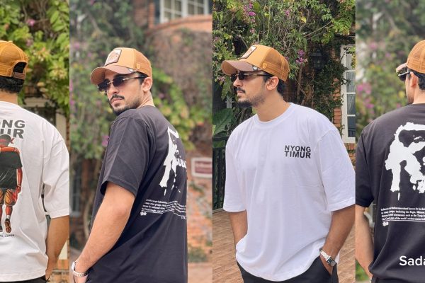 Model mengenakan koleksi kaos streetwear SA&KO seri Nyong Timur dan Sulawesi dengan artwork orisinal bertema Indonesia Timur.